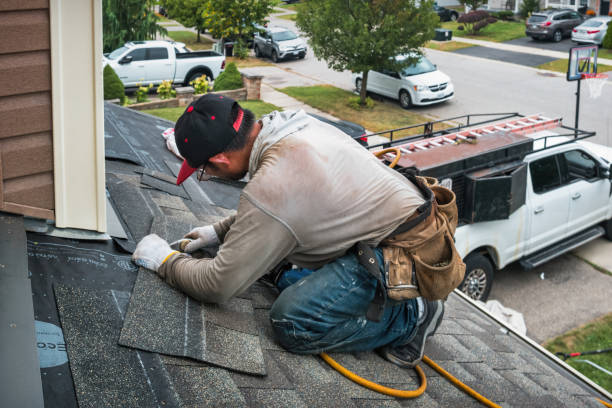 Professional Hail Damage Roof Repair technician working in Springville, VA